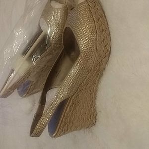 Gold peep toe wedges